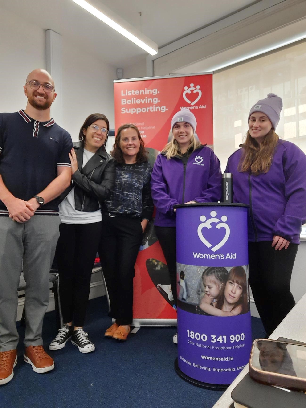 A group of Women's Aid and Trinity Group team at Women's Aid offices in Dublin 